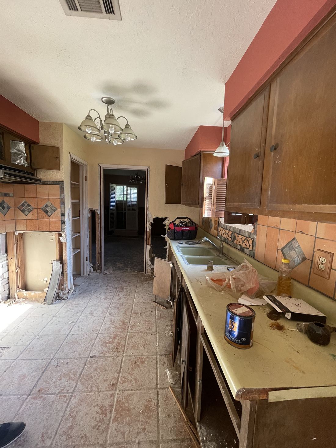 Original Friendswood kitchen with water-damaged cabinets