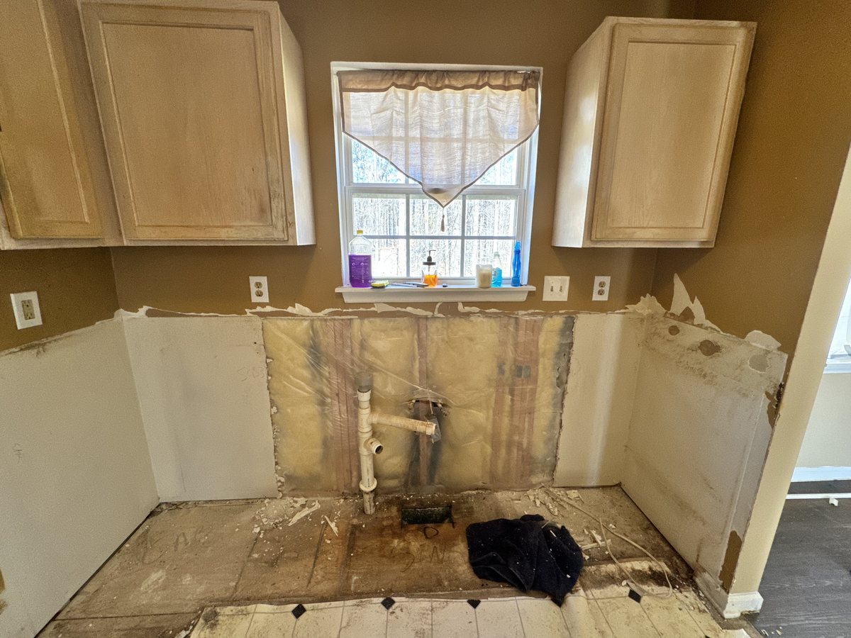 Wendell kitchen wall opened up during demolition revealing water damage